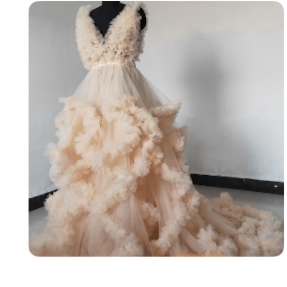 Elegant Cream Ruffled Gown
